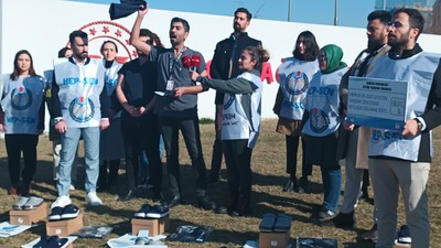 HEP-SEN'den formalı terlikli giyim yardımı protestosu