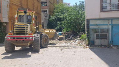 Manisa'da bir evden 13 kamyon çöp çıktı
