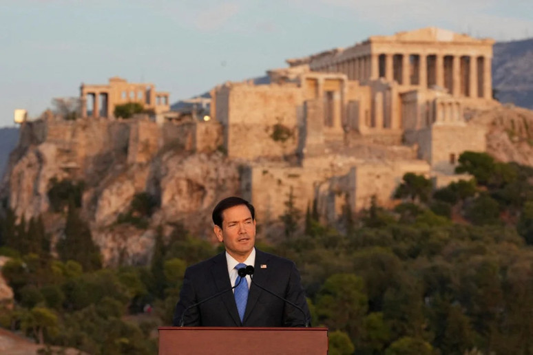 Rubio spoke with the historic Pnyx Hill opposite the Acropolis behind him (October 7, 2026).